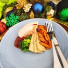 Lean and tender breast of turkey, oven roasted with extra moisture, served with homemade sage & bacon stuffing, roasted carrots & pumpkin, steamed broccoli, and with our own delicious cranberry sauce.